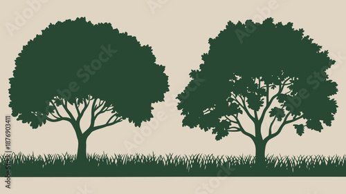 Two green trees with lush foliage on grassy terrain