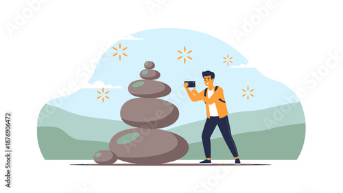 Man Photographing a Stack of Stones in a Scenic Landscape