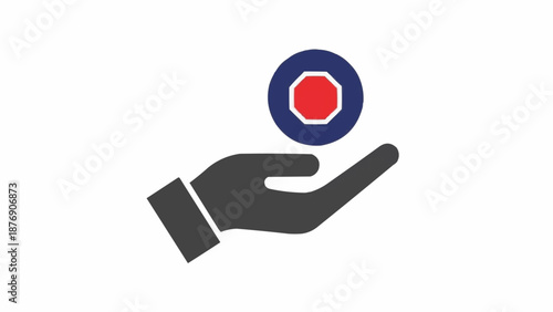 Hand holding a colorful circular object.