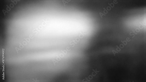 Natural blurry light leaks motion video. The abstract motion background with defocused light spots, monochrome clip