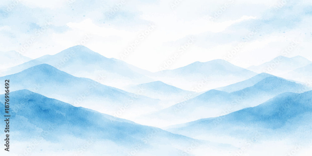 Fototapeta premium A beautiful aerial view of white clouds in the blue sky over a snowy mountain landscape with misty hills at sunset