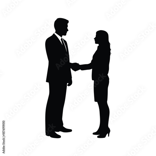a man and woman shaking hands in business attire