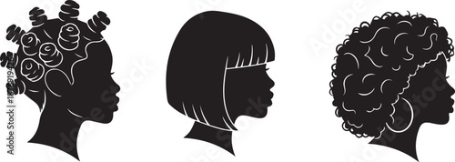 Three black and white silhouette profiles of women with different hairstyles and floral decorations