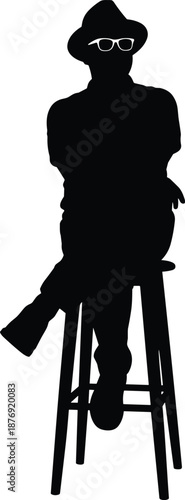 Silhouette of a man sitting on a stool wearing a hat and glasses person