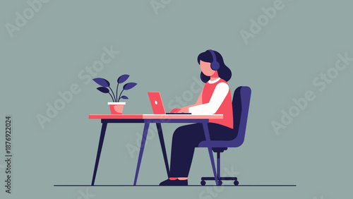 Woman Working on Laptop at Desk.