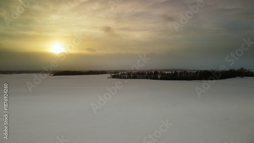 A cold, gloomy winter day ends with a warm and soothing sunset