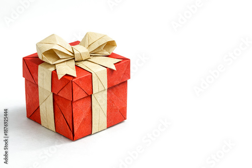 Origami gift box with ribbon made of realistic colored paper  