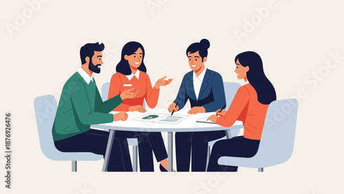 Four People Sitting Around Table Discussing.