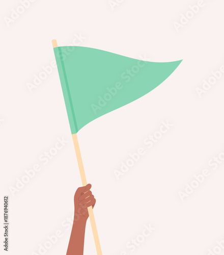 Hand with brown skin tone holding up a triangular green flag, flat vector illustration