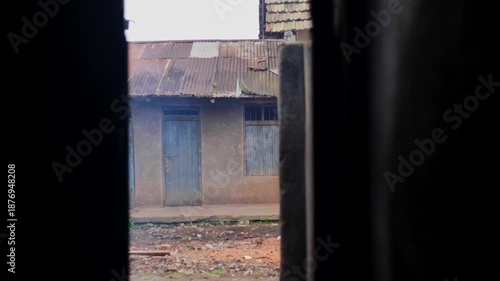 Door and window seen from a hallway in the morning in Africa