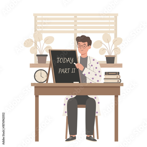 Man teaching with chalkboard at desk