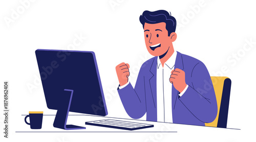 Businessman celebrating success at his computer desk