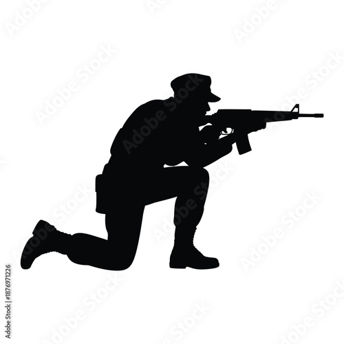 Soldier in kneeling position aiming rifle high quality