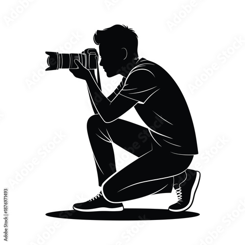 man taking picture with camera in squatting position