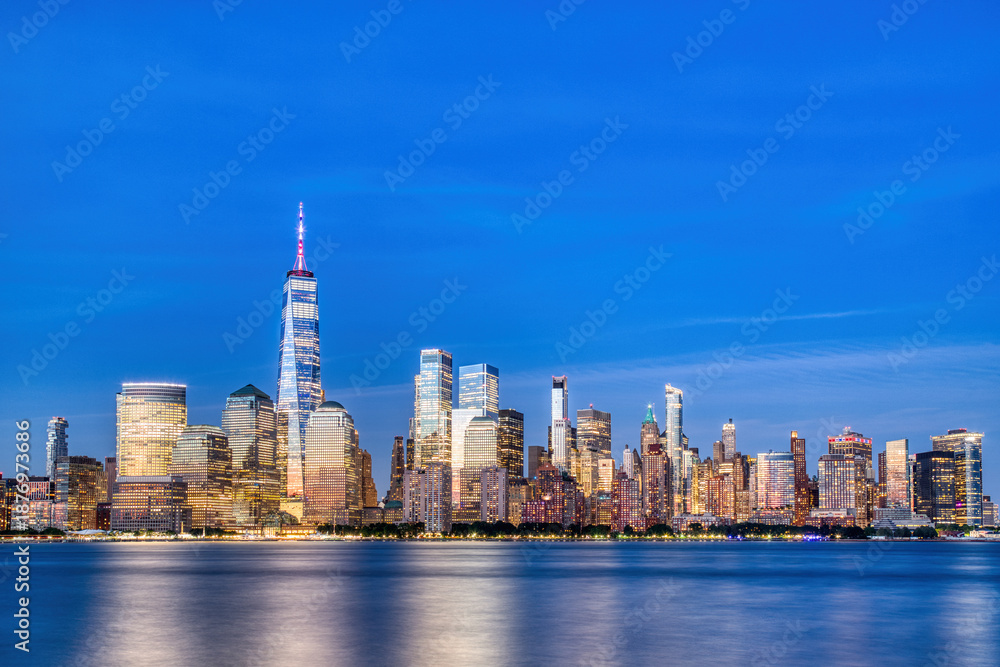 Fototapeta premium Illuminated New York City Skyline View at Dusk, New York
