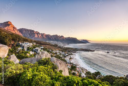 Cape Town Sunset over Camps Bay Beach with Table Mountain and Twelve Apostles in the Background