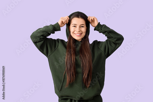 Young woman in khaki hoodie...
