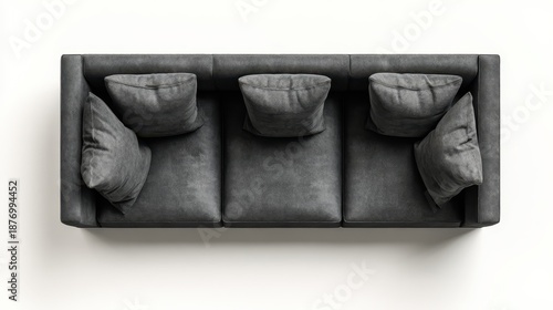 Dark gray three seater sofa with deep cushions and plump back pillows in a minimalist living room setting, modern upholstered design conveying comfort and contemporary style
