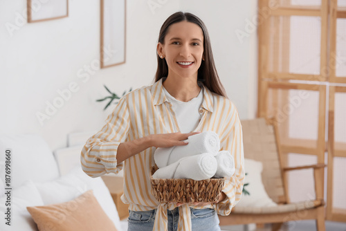 Young woman with basket of ...