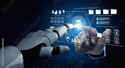 Bild auf Leinwand A robot hand interacts with a digital display featuring artificial intelligence elements, showcasing the convergence of technology and innovation in a modern workspace