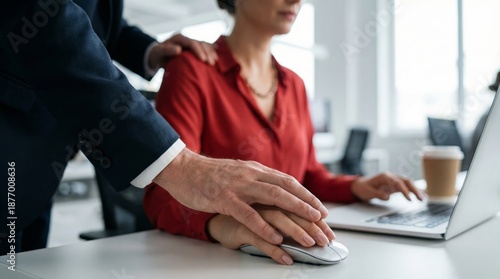 Workplace harassment: man's hands on woman's mouse and shoulder