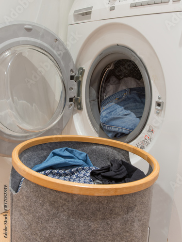 Loaded washing machine and laundry basket