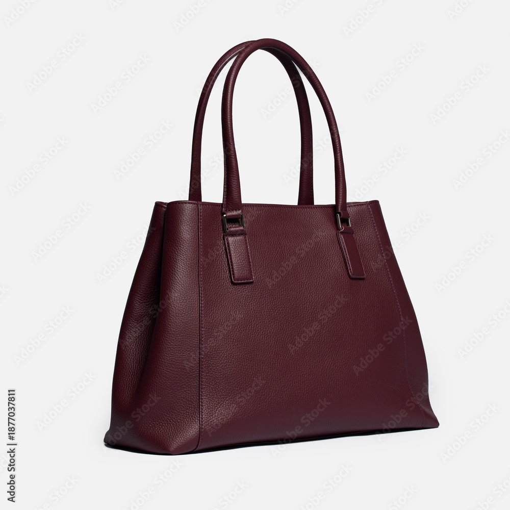 Naklejka premium Women's handbag on a white background.