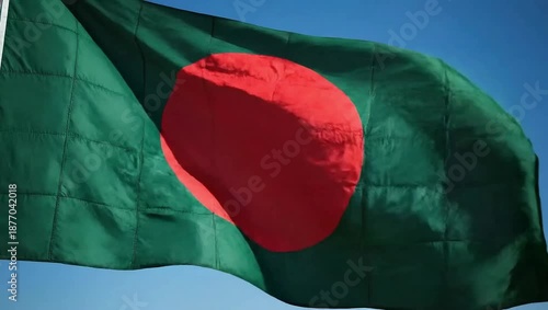 Wallpaper Mural National flag of Bangladesh waving against a clear blue sky Torontodigital.ca