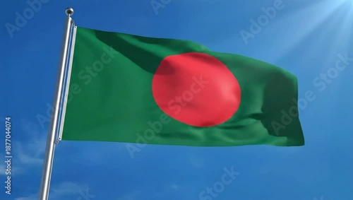 Wallpaper Mural National flag of Bangladesh waving on a flagpole against a clear blue sky with sun rays shining down Torontodigital.ca