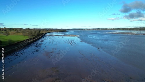 River Exe, South Devon, England: DRONE VIEWS: The River Exe estuary; the surrounding countryside and the railway track running from Exeter to Penzance. The River Exe is a magnet for tourists.