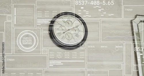 Fototapeta Showing dark-rimmed analog clock with subdials on wooden desk with HUD overlays and partial device