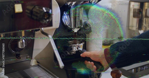 Gripping portafilter, dark-sleeved hand locking into espresso machine at bar with tamper and cups