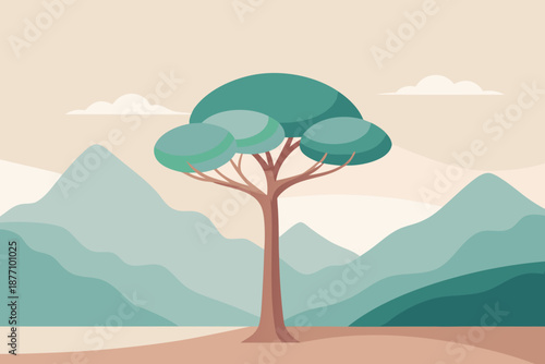 Serene landscape with solitary tree in front of majestic mountains