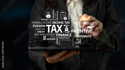 Fotografia A business professional engages with key tax concepts through digital technology, showcasing the intersection of finance and modern advisory in the corporate environment