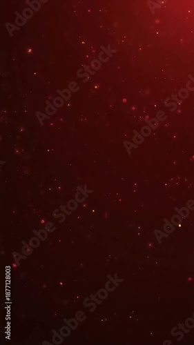 Red glowing sparkling particles on a blurred background, perfect for festive design projects, christmas promotions, or mysticalthemed digital art creations.