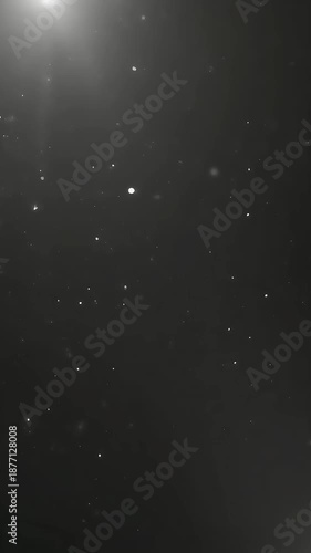 iny white particles in dark gray background. Suitable for abstract designs, science concepts, backgrounds, or technology themes in various projects.