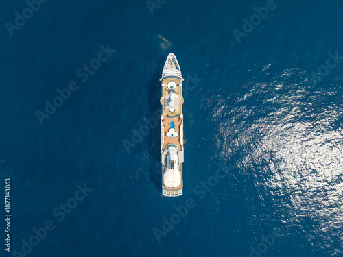 top down view of Cordelia Cruises luxury passenger ship sailing in the Arabian Sea, capturing modern cruise travel, marine transportation, vacation tourism, and Indian cruise industry.
