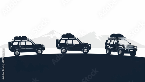 Three black SUVs with roof racks driving on a mountain road.