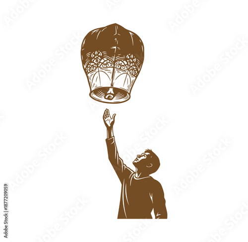 boy releasing a hot air balloon into the sky with his hand