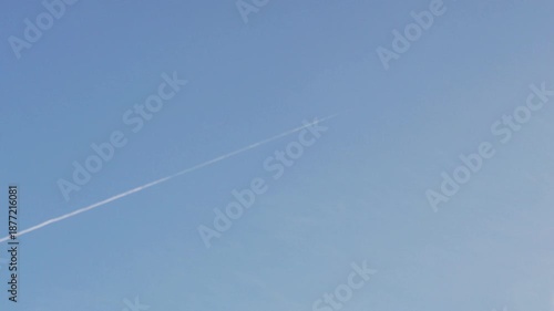 Fighter Jet Smoke Trail in Clear Blue Sky