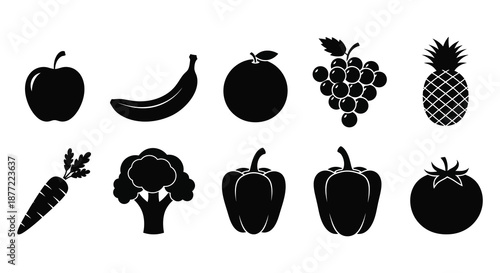 A collection of various fruits and vegetables depicted in a stark black silhouette