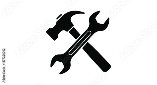 A crossed hammer and wrench presented in a striking black graphic style silhouette