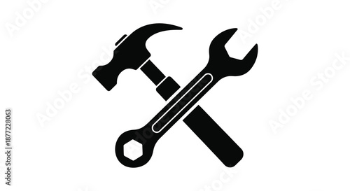 A striking depiction of crossed hammer and wrench tools in a dark bold silhouette