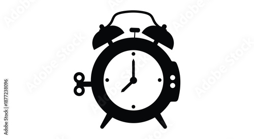 A stark black outline of a classic twin bell alarm clock showcasing time s passage silhouette