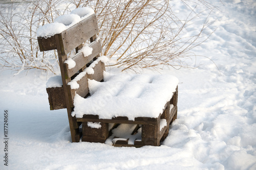 Wallpaper Mural Wooden pallet bench covered in fresh snow on a bright winter day Torontodigital.ca