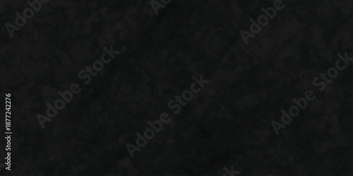 Dark charcoal grunge wall texture background. Dark black rough grunge surface with smoke edge. Black texture chalk board and black board.