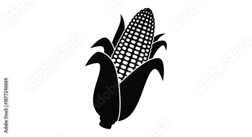 A striking black and white depiction of a corn cob with surrounding leaves silhouette