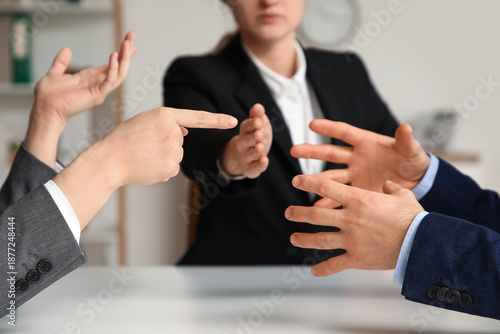 Bild auf Leinwand Hands of arguing clients at mediator's office, closeup