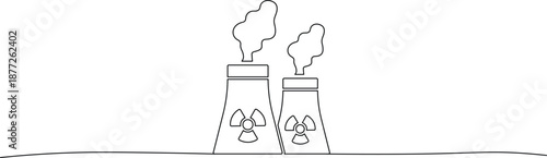 Nuclear power plant towers with radiation symbols and smoke emissions in industrial landscape