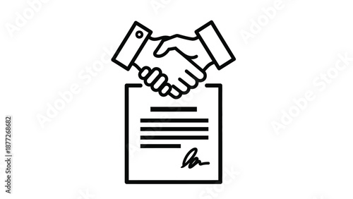 Handshake over a signed document signifies successful business agreement completion